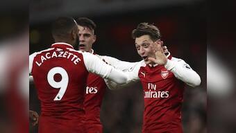 Premier League: Roberto Firmino rescues a point for Liverpool in entertaining draw against Arsenal