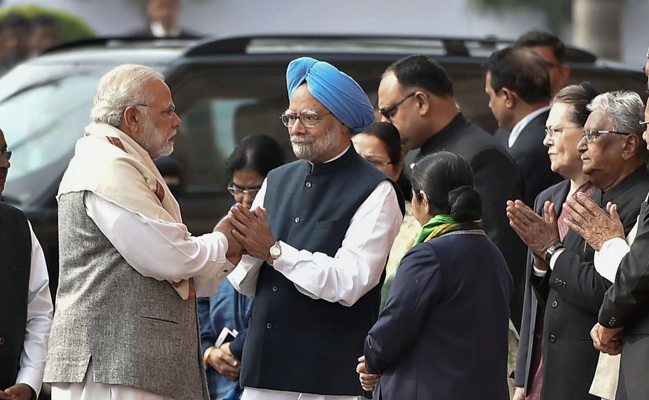 Just before the ceremony began, Singh greeted Modi with a 'namaste' to which the latter briefly cupped his hands. PTI Just before the ceremony began, Singh greeted Modi with a 'namaste' to which the latter briefly cupped his hands. PTI