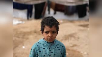 Syrian refugee camps in Jordan draw Asian tourists looking for selfies, adoptions