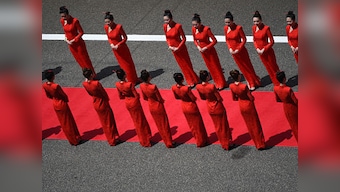 Formula One ends practice of using 'grid girls' before races to keep up with modern day societal norms