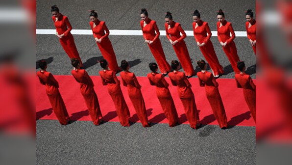Formula One ends practice of using 'grid girls' before races to keep up with modern day societal norms