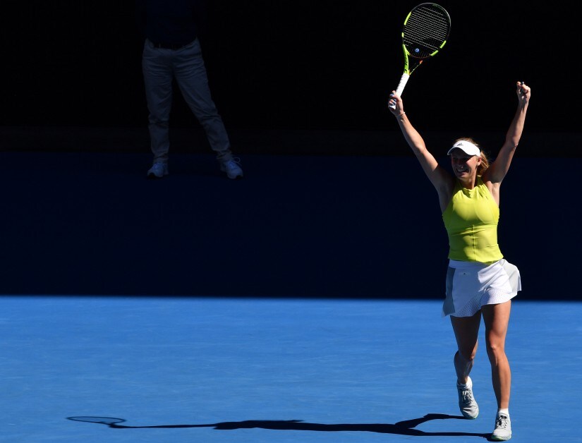 Caroline Wozniacki reacts after beating Jana Fett in their second round match on day three of the Australian Open. AFP