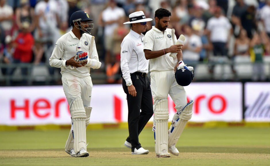 The inevitable after Tea as India were bowled out for 135. Here Mohammed Shami and Jasprit Bumrah leave the field dejected after India lost to South Africa by 72 runs. AP The inevitable after Tea as India were bowled out for 135. Here Mohammed Shami and Jasprit Bumrah leave the field dejected after India lost to South Africa by 72 runs. AP