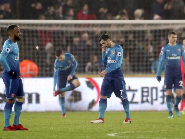 Premier League: Arsenal crash to shock defeat at Swansea; Liverpool swat aside Huddersfield Premier League: Arsenal crash to shock defeat at Swansea; Liverpool swat aside Huddersfield
