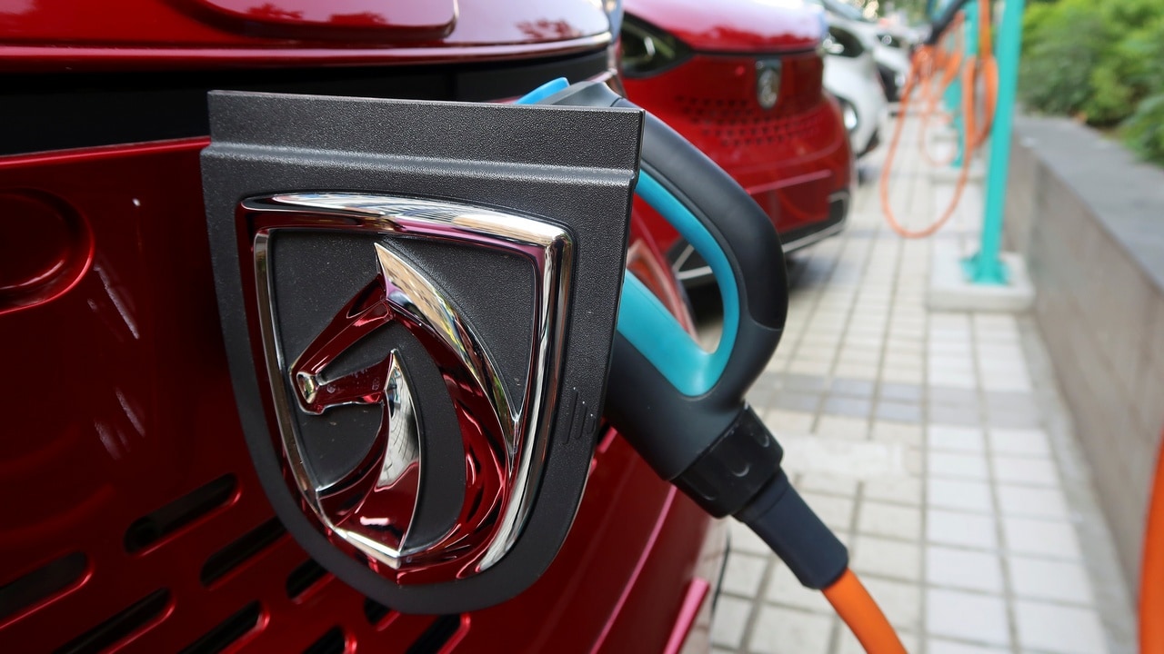A Baojun E100 all-electric battery car is being charged in the parking lot in Liuzhou, Guangxi Zhuang Autonomous Region, China. Image: Reuters