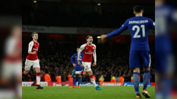 Premier League: Arsenal's Hector Bellerin strikes late to snatch draw in thrilling London derby against Chelsea