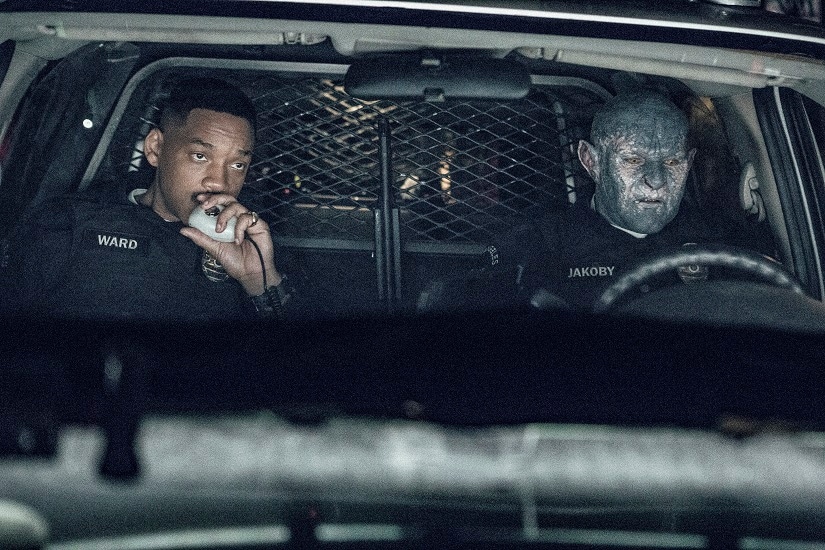 FILE - This undated image released by Netflix shows Will Smith, left, and Joel Edgerton in a scene from, "Bright." Despite scathing reviews from critics, Netflix has greenlit a sequel to “Bright,” with star Smith and director David Ayer expected to return. The streaming service announced the plans Wednesday, Jan. 3, 2018, just two weeks after the fantasy police drama debuted. (Matt Kennedy/Netflix via AP, File)