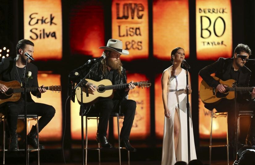 The Brothers Osborne, from left, Maren Morris and Eric Church perform at the 60th annual Grammy Awards at Madison Square Garden on Sunday, Jan. 28, 2018, in New York. (Photo by Matt Sayles/Invision/AP)