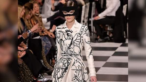 Dior designer Maria Grazia Chiuri channels surrealism in predominantly black-and-white fashion show