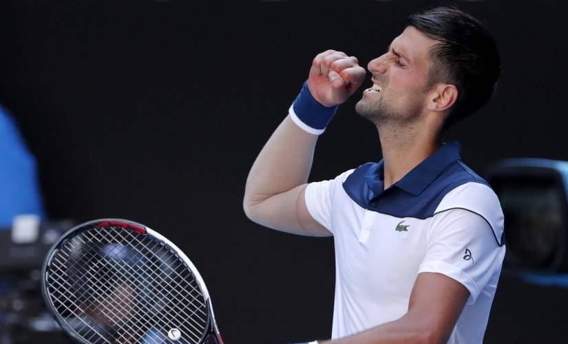 Novak Djokovic reacts after defeating Gael Monfils during their second round match at the Australian Open. AP