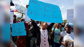 Dozens protest outside US embassy in Haiti's Port-au-Prince over Donald Trump 'shithole' comment