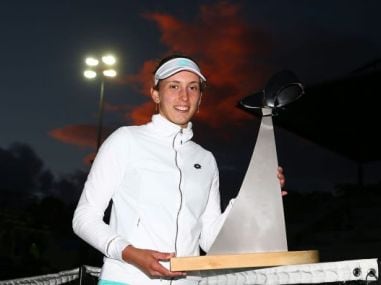 Elise Mertens with the trophy after he win in the final. Image courtesy: Hobart International website