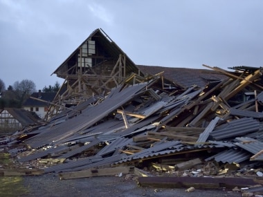 An agricultural building is collapsed during a heavy storm in Meimbressen, central Germany. AP