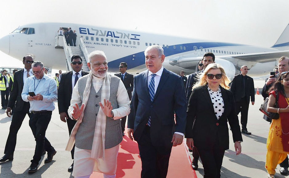 In the morning, Modi received Netanyahu and his wife Sara at the Ahmedabad airport and the leaders proceeded in a roadshow toward the Sabarmati Ashram, with crowds of people thronging both sides of the road. PTI In the morning, Modi received Netanyahu and his wife Sara at the Ahmedabad airport and the leaders proceeded in a roadshow toward the Sabarmati Ashram, with crowds of people thronging both sides of the road. PTI