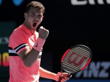 Grigor Dimitrov celebrates a point win over Dennis Novak during their first round match. AP