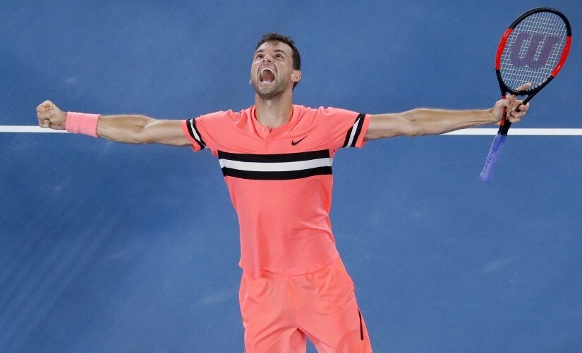 Grigor Dimitrov celebrates after winning his fourth round match against Nick Kyrgios at the Australian Open. Reuters