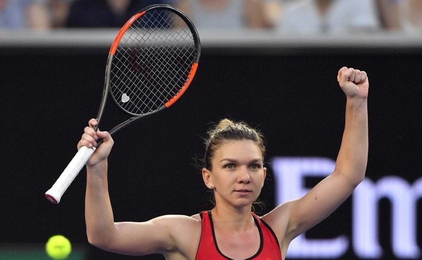 Simona Halep celebrates after defeating Eugenie Bouchard in their second round match at the Australian Open. AP