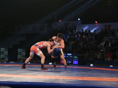 Haryana Hammers Vladimir Khinchegashvili(orange) beat Mumbai Maharathis Eedenebatyn Bekhbayar(white) by 8-4 on day 12 of the 3rd Pro Wrestling League being held at Siri Fort Stadium in New Delhi. PWL