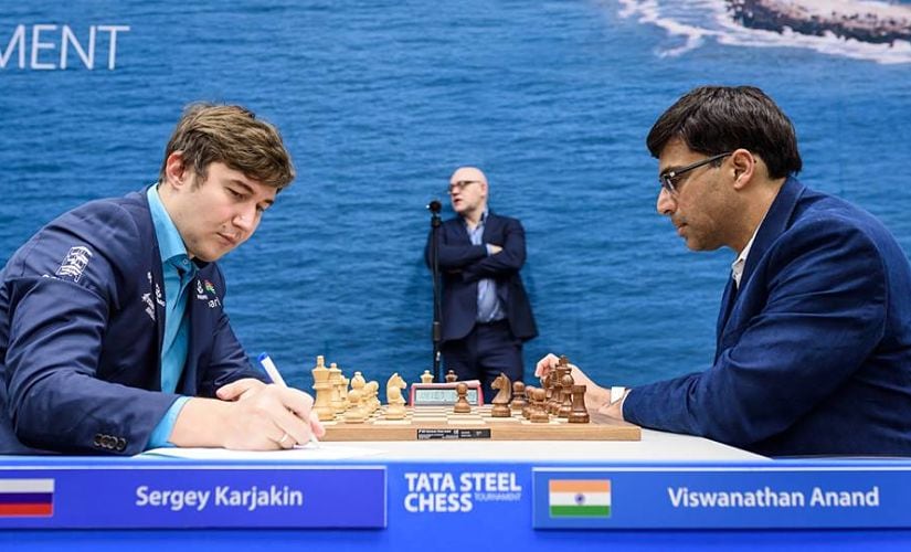 Tata Steel Chess: Magnus Carlsen beats Viswanathan Anand to take sole lead