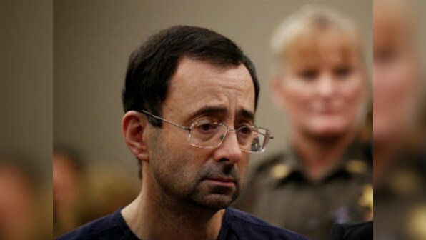 Former USA Gymnastics doctor Larry Nassar sentenced to up to 175 years in prison for decades of sexual abuse