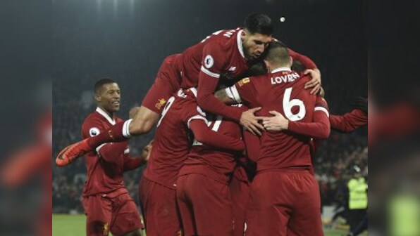 Premier League: Liverpool look to carry winning momentum in clash against struggling Swansea