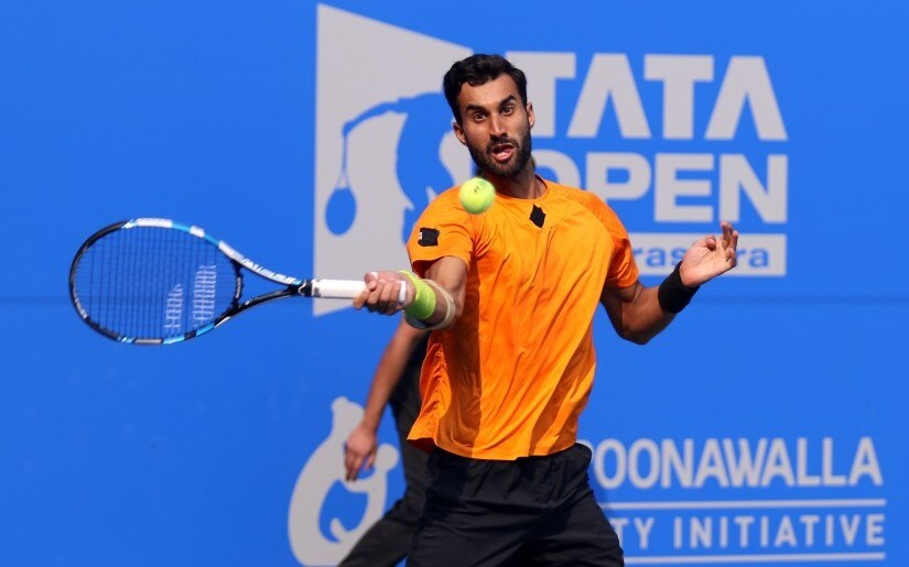 Yuki Bhambri plays a shot in his second round match against Pierre-Hugues Herbert at the Maharashtra Open. Firstpost