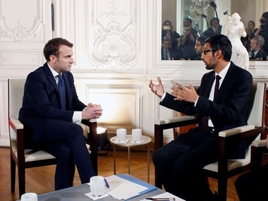 French President Emmanuel Macron (L) attends a meeting with Google CEO, Sundar Pichai in Paris. Image: Reuters