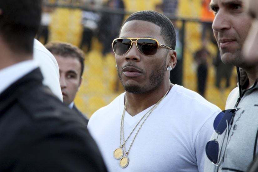FILE- In this March 13, 2015 file photo, rapper Nelly approaches the stage for a concert in Irbil, northern Iraq. A woman who alleges the rapper Nelly raped her on his tour bus after a performance in Seattle says he sexually assaulted two other women in England. Attorney Scott Rosenblum said Saturday, Jan. 27, 2018 in an email that the allegations are “completely fabricated” and the lawsuit is a “money grab.” The amended complaint filed Jan. 22 in a Seattle court does not list the women by name. (AP Photo/Seivan M. Salim, File)