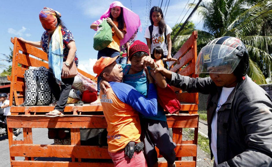 A total of 60,821 people who resided in the danger zone were evacuated and relocated to 30 shelters in the region. AP A total of 60,821 people who resided in the danger zone were evacuated and relocated to 30 shelters in the region. AP