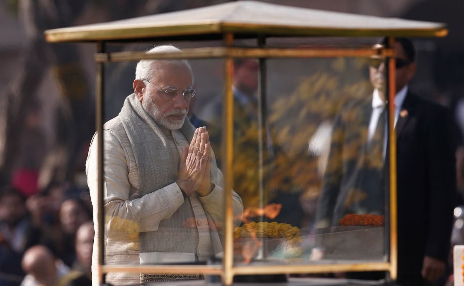 Modi paying tribute to Mahatma Gandhi at Raj Ghat. Modi said, Modi paying tribute to Mahatma Gandhi at Raj Ghat. Modi said,