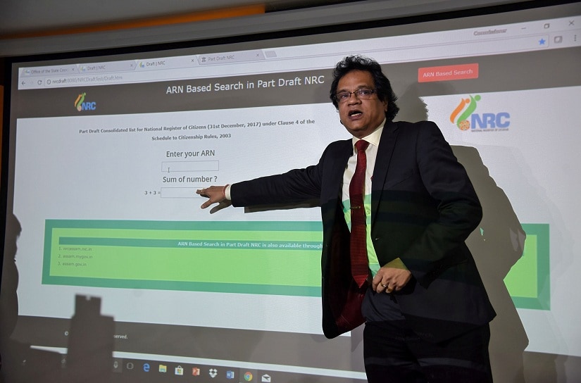 Prateek Hajela, Assam's chief co-coordinator of the National Register of Citizens (NRC), demonstrates how to check a name online on its website after the publication of the first draft of the NRC in Guwahati city in the northeastern state of Assam, India, January 1, 2018. Picture taken January 1, 2018. REUTERS/Anuwar Hazarika - RC1883ABA7F0