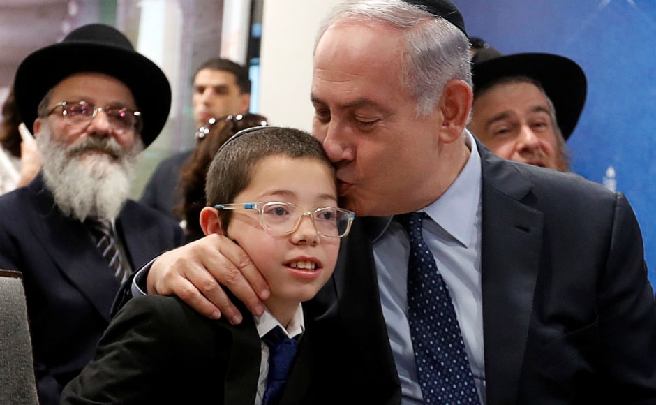 The Israeli prime minister later arrived at Chabad House where he paid tribute to victims of 26/11 terror attack. He also met terror attack survivor Moshe Holtzberg. Reuters The Israeli prime minister later arrived at Chabad House where he paid tribute to victims of 26/11 terror attack. He also met terror attack survivor Moshe Holtzberg. Reuters