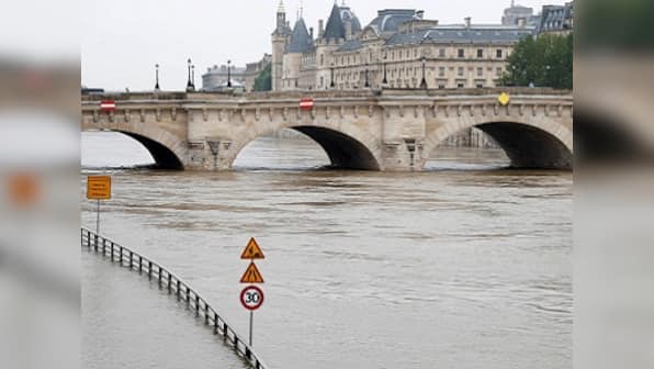 Paris readies for floods as river Seine engulfs large parts of cities; wine cellers and museum basements under threat