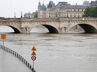 Paris readies for floods as river Seine engulfs large parts of cities; wine cellers and museum basements under threat