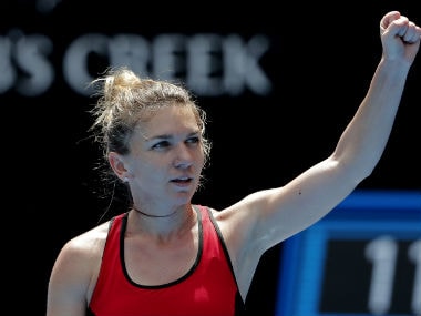 Simona Halep celebrates after her hard-fought win over .AP