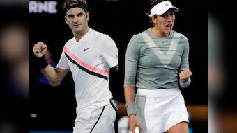 Australian Open 2018: Roger Federer begins title defence in style, heavily-strapped Garbine Muguruza advances
