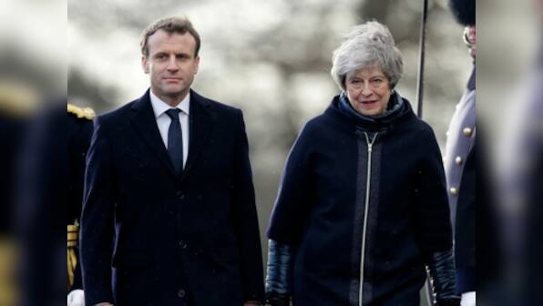 Theresa May, Emmanuel Macron ink new border security deal; UK to pay $62 million to France to stop migrants