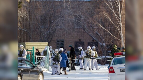 Teenager attacks fellow students at school with axe in Russia; wounds teacher, five children