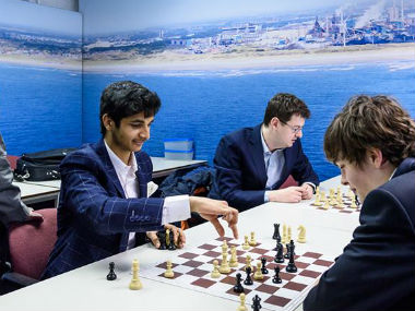 Tata Steel Chess Round 13: Vidit Gujrathi clinches title in Challengers; Magnus Carlsen beats Anish Giri to win Masters Tata Steel Chess Round 13: Vidit Gujrathi clinches title in Challengers; Magnus Carlsen beats Anish Giri to win Masters