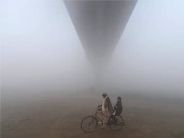 Delhi records coldest December since 1901 as minimum temperature drops to 2.4 degrees Celsius; heavy fog affects air, rail traffic