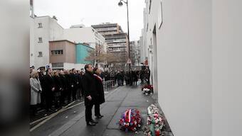 French president Emmanuel Macron commemorates Charlie Hebdo attack in low-key ceremony
