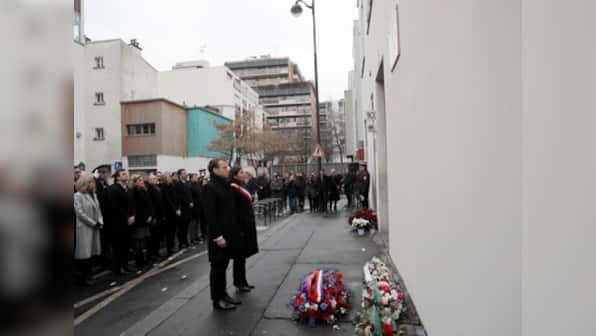 French president Emmanuel Macron commemorates Charlie Hebdo attack in low-key ceremony