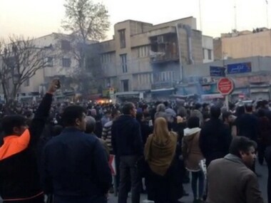 People protest in Tehran, Iran on 30 December. Reuters