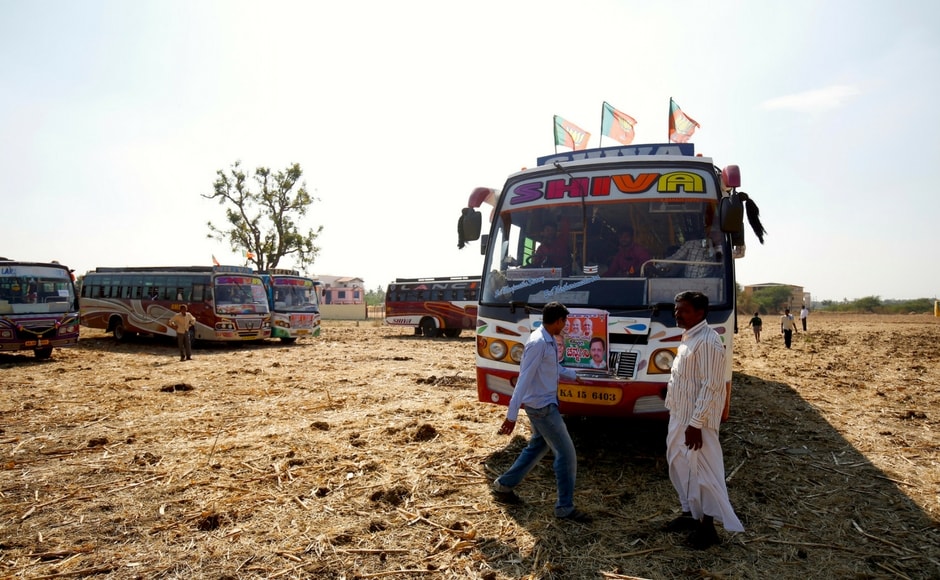 Many private buses were hired to ferry villagers from nearby taluks for Shah's rally on Wednesday. Image courtesy: 101Reporters/Nivedita Niranjankumar Many private buses were hired to ferry villagers from nearby taluks for Shah's rally on Wednesday. Image courtesy: 101Reporters/Nivedita Niranjankumar