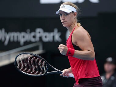 Angelique Kerber of Germany celebrates winning the first set against Dominika Cibulkova of Slovakia during their women's quarterfinal singles match at the Sydney International. AP