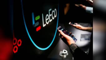 Debt-laden LeEco CEO defies China's order to return to the country; stays in USA to raise funds for his electric car business