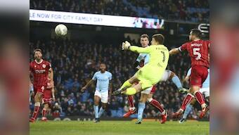 League Cup: Last-gasp Sergio Aguero goal in first leg hands Manchester City edge over Bristol City in semis