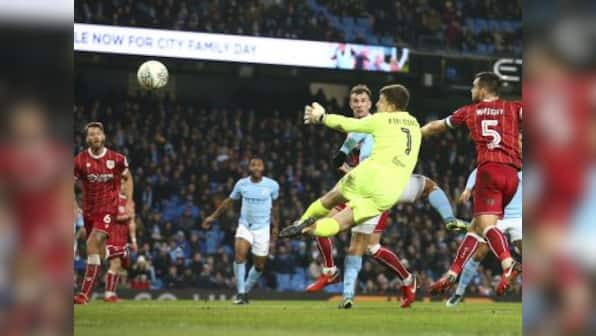 League Cup: Last-gasp Sergio Aguero goal in first leg hands Manchester City edge over Bristol City in semis
