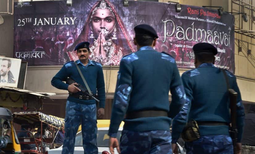 Security personnel guard outside a cinema house after release of the film Padmaavat in the walled city of Delhi on Thursday. PTI