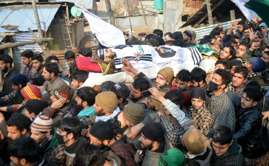 Thousands of people participated in the funeral procession of Khanday on Monday amid pro-freedom and pro-Islamic slogans. Clashes were reported after the funeral when the crowd resorted to stone-pelting. Security forces were forced to use tear-smoke shells to disperse the crowd. Firstpost/Sameer Mushtaq Thousands of people participated in the funeral procession of Khanday on Monday amid pro-freedom and pro-Islamic slogans. Clashes were reported after the funeral when the crowd resorted to stone-pelting. Security forces were forced to use tear-smoke shells to disperse the crowd. Firstpost/Sameer Mushtaq
